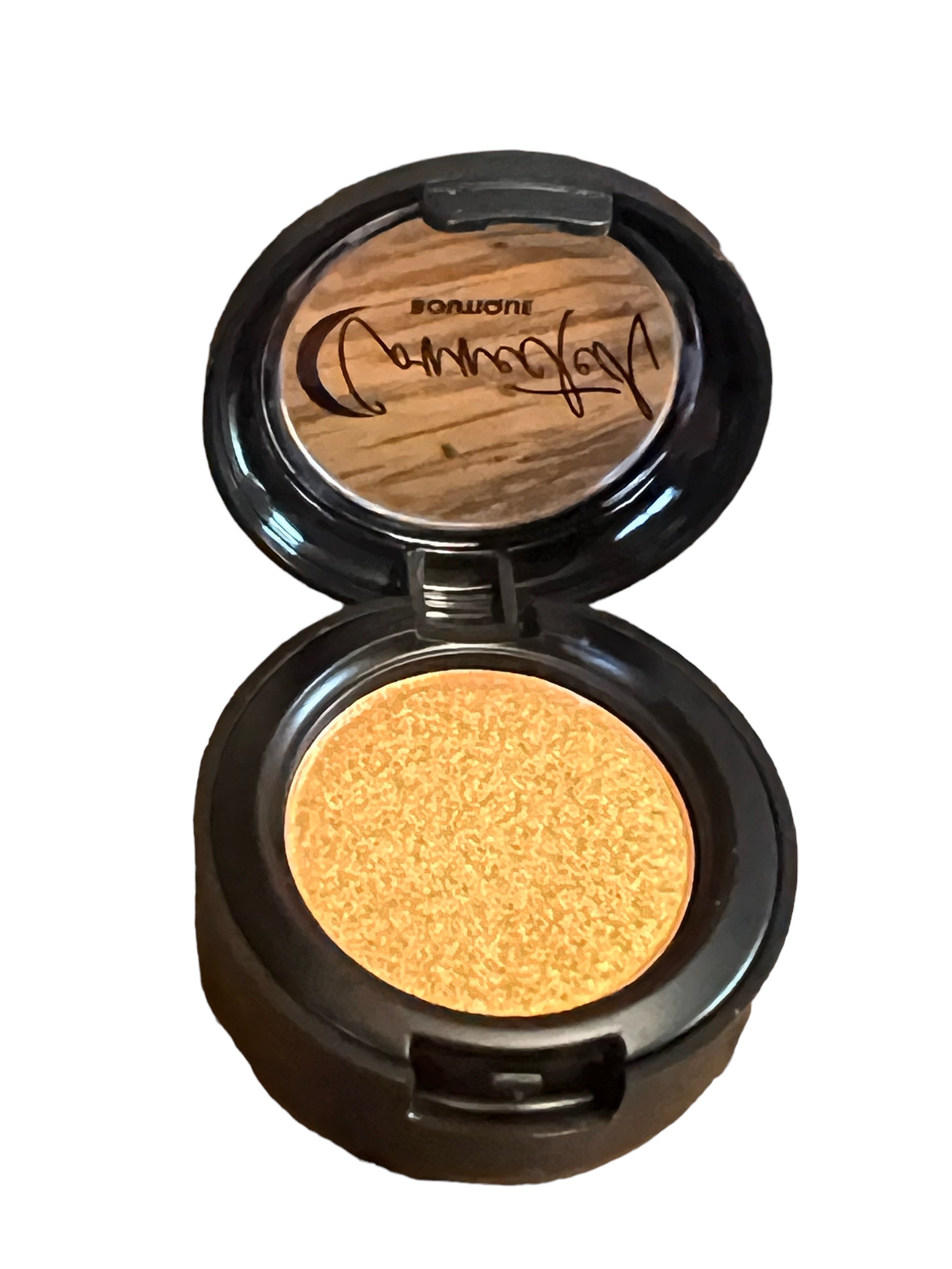 “Astral Kiss” orange shimmer single eyeshadow