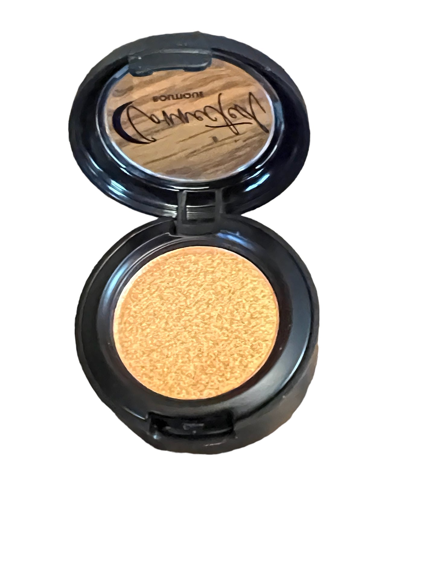 “Astral Kiss” orange shimmer single eyeshadow