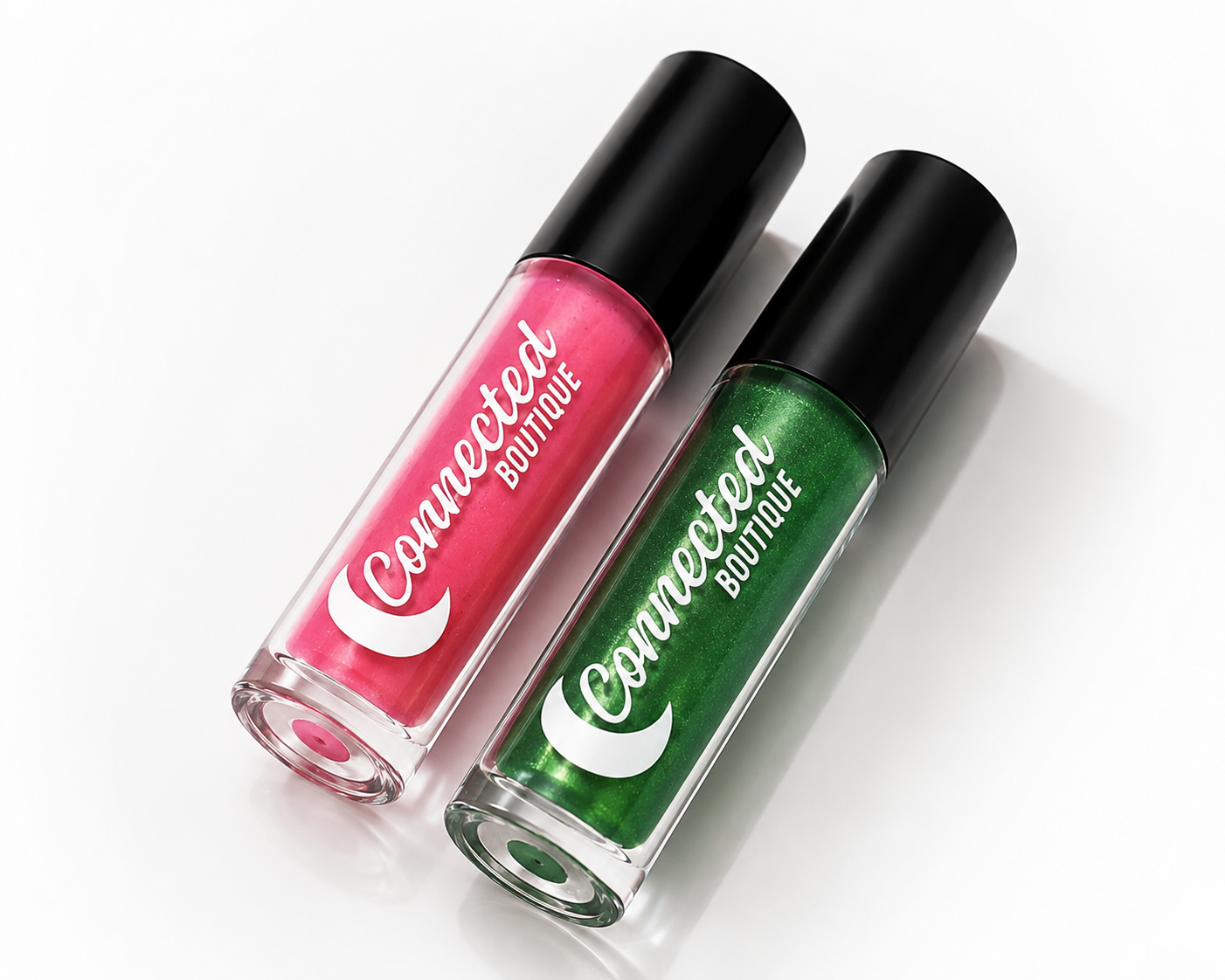 Two lip glosses, one pink and one green, with 'Connected Boutique' branding on a white background.